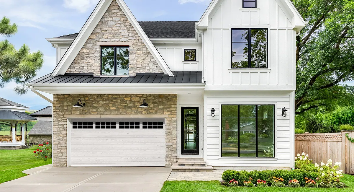 white plank garage door on home