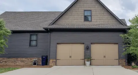 Safe-Way Aristocrat Monarch garage doors in a tan finish