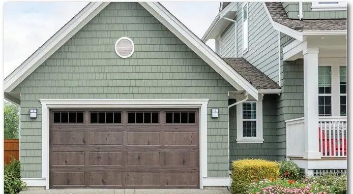 Classic Safe-Way Bi-Directional Wood Grain garage door shown on a home