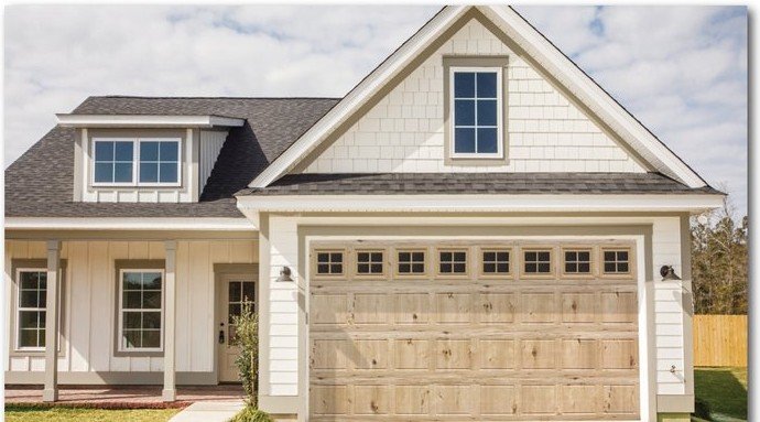 Natural Safe-Way Plank Wood Grain garage door shown on a home