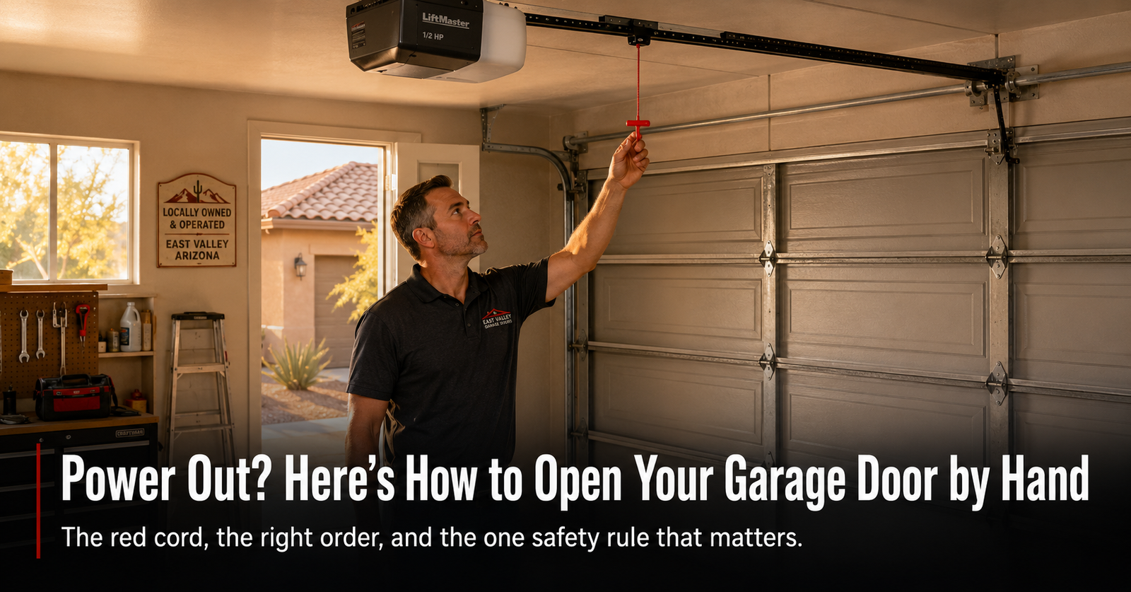 Garage Door Won't Open After Power Outage: Manual Release Step-by-Step | Farnsworth Garage Door Service Close-up of a red emergency release cord hanging from a residential garage door opener rail inside an East Valley Arizona home garage, after a monsoon power outage.